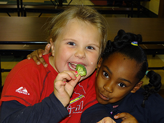 Catch Healthy Habits kids eating broccoli