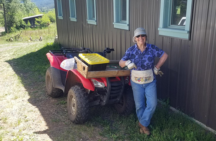 Denis Norlander still uses the nail apron made for her by Frank Acree, a longtime Albuquerque Oasis volunteer, as she works on her farm in Oregon.