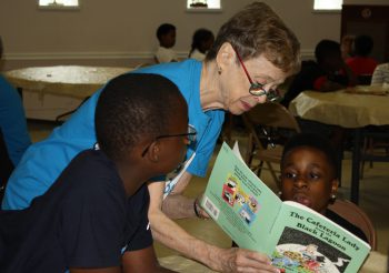 Karen Priest and Student Reading