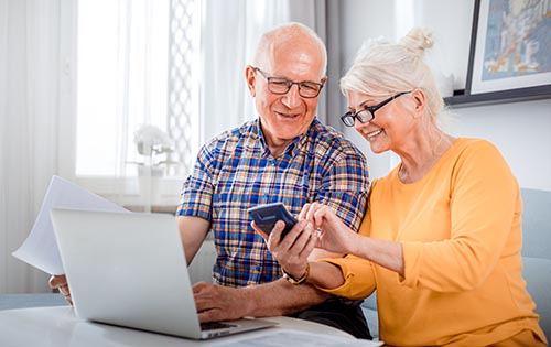 Senior couple registering online